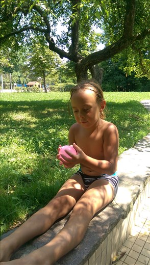 Water balloon fight on a hot hot day