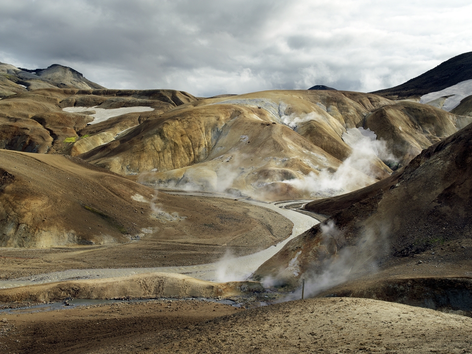 These 4 pictures have been taken in Kerlingarfjöll which is a mountain range in the middle of the Icelandic Highlands, reach by Road 35 (S-W of the Hofsjökull glacier) only 3 or 4 month per year. 

''Fjöll' means mountains and 'Kerling' means old lady ( in a sense of 'witch'). The name of the area, inspired by ancient folk tales, come from a 25m high volcanic tuff stone pillar. It is said that an old troll lady was caught out by the sunrise and therefore turned to stone.

The area was hardly ever visited before the past century both because it was very remote, but also because it was thought to be the homeland of trolls and the only people that would venture there were thieves and outlaws.