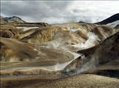 These 4 pictures have been taken in Kerlingarfjöll which is a mountain range in the middle of the Icelandic Highlands, reach by Road 35 (S-W of the Hofsjökull glacier) only 3 or 4 month per year. 

''Fjöll' means mountains and 'Kerling' means old lady ( in a sense of 'witch'). The name of the area, inspired by ancient folk tales, come from a 25m high volcanic tuff stone pillar. It is said that an old troll lady was caught out by the sunrise and therefore turned to stone.

The area was hardly ever visited before the past century both because it was very remote, but also because it was thought to be the homeland of trolls and the only people that would venture there were thieves and outlaws.: by guillaumefandel, Views[884]