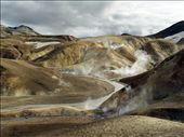 These 4 pictures have been taken in Kerlingarfjöll which is a mountain range in the middle of the Icelandic Highlands, reach by Road 35 (S-W of the Hofsjökull glacier) only 3 or 4 month per year. 

''Fjöll' means mountains and 'Kerling' means old lady ( in a sense of 'witch'). The name of the area, inspired by ancient folk tales, come from a 25m high volcanic tuff stone pillar. It is said that an old troll lady was caught out by the sunrise and therefore turned to stone.

The area was hardly ever visited before the past century both because it was very remote, but also because it was thought to be the homeland of trolls and the only people that would venture there were thieves and outlaws.: by guillaumefandel, Views[697]