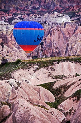 Early morning hot air balloon ride in the lunar like landscape of Cappadocia