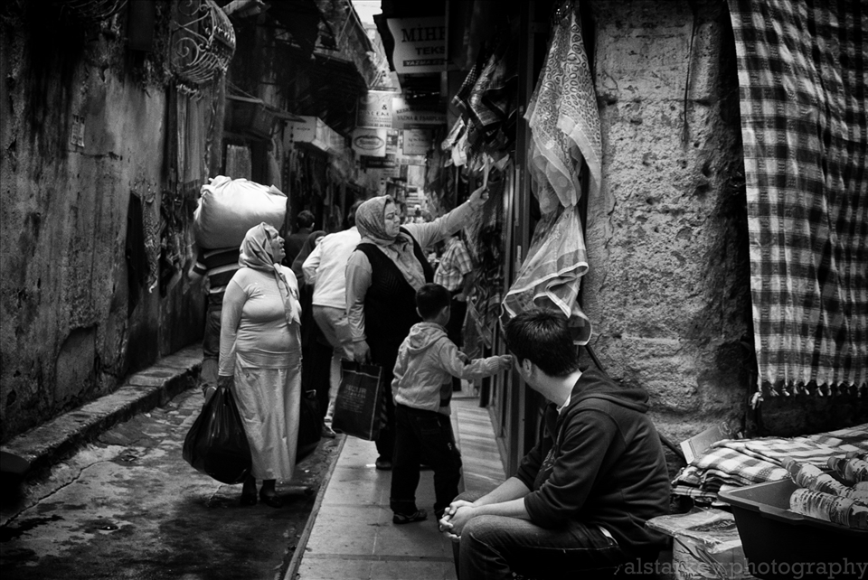 Women browse the various scarves at The Grand Bazaar