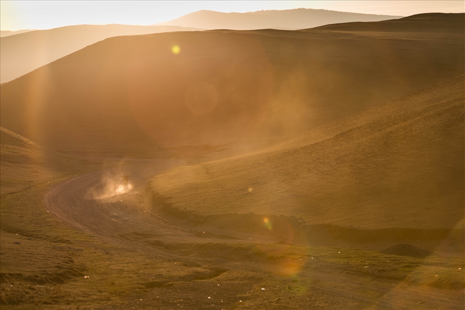 Riding in the sunset after the storm.