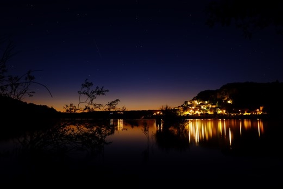 A night by the quiet lake of Sainte-Croix, there was a big party going on in the city across the lake.