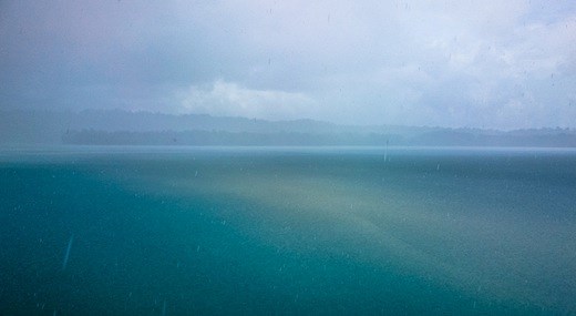 Rain pouring over the waters just off Manus Island, PNG.