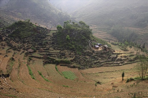 Lonely settlement (Ha Giang, Vietnam) 
Living is hard in Ha Giang. People live from their corn. In hard work they have to cultivate the poor soil. The water for the daily life comes from the rain or the river in the valley.  

