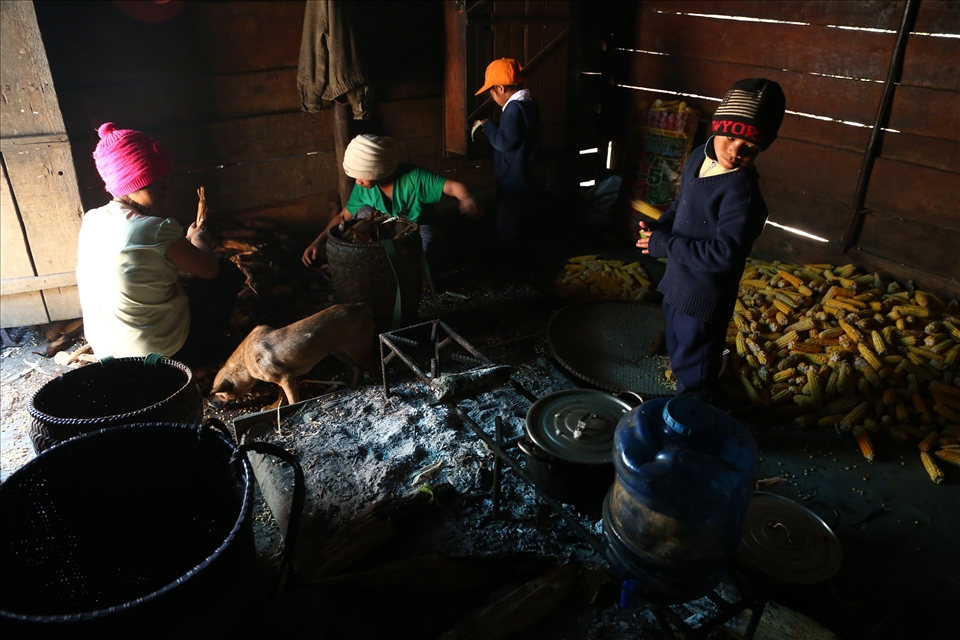 Even at home children cannot play or relax, they have to help preparing the crops.