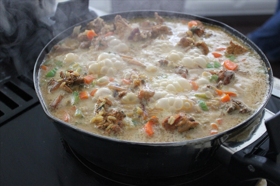 What the pelau looks like after adding all ingredients and it begins to simmer.