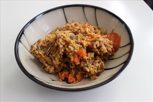 Pelau with Matouk's pepper sauce. 