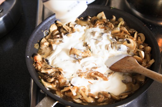 now stir in the cream and simmer the mixture till the mushroom is soft.
