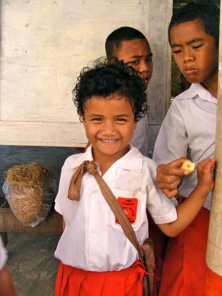 While in Samoa my son had the opportunity to go into a school and read to some of the students there.  While we were at the school this little girl stole my heart.  She just stood there staring at me with those warm brown eyes and beautiful smile.  That smile came to represent what I came to know of the Samoan people on my trip.  Such a happy, generous, and caring people.