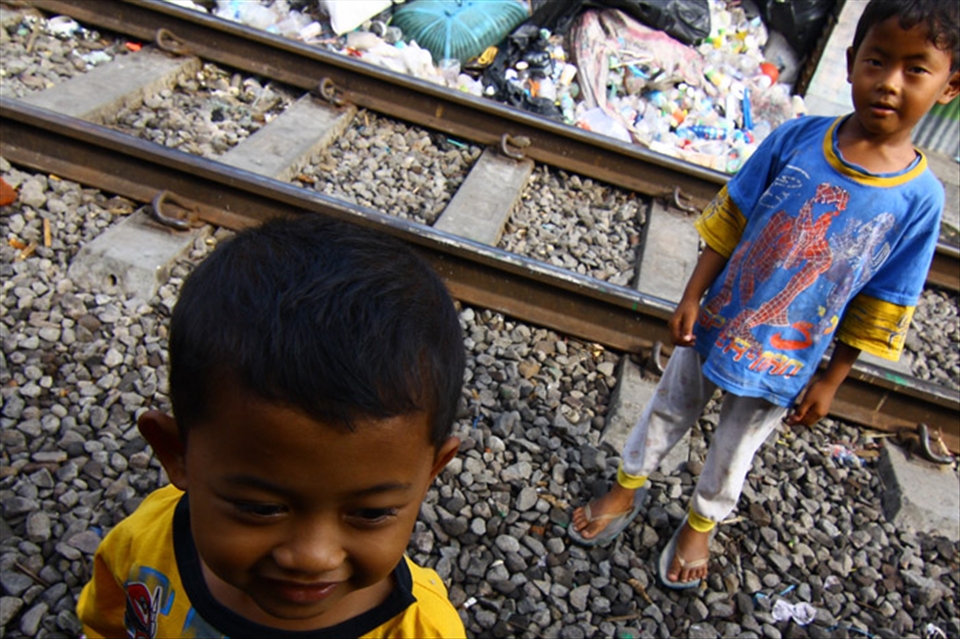 Children play alongside the railways