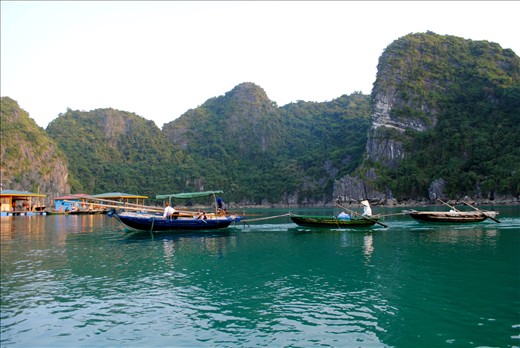 Two men help out a fellow neighbour