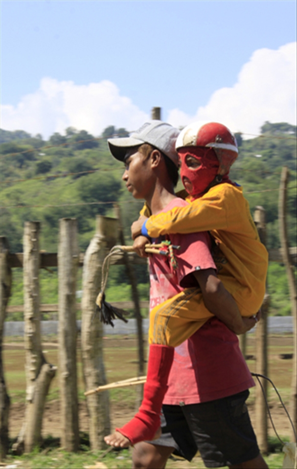 To save the energy, this kid have a 