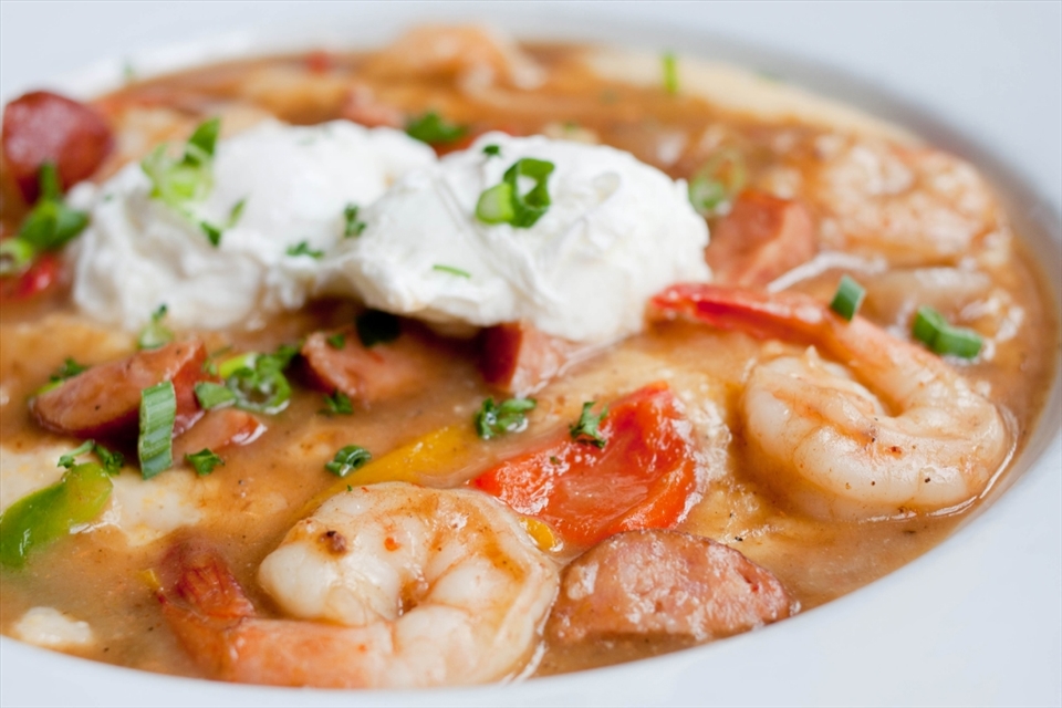 Conquering fears over good food. Poogan's porch is a restuarant that has a history for being haunted, but being known for their good food like grits can make anyone brave.