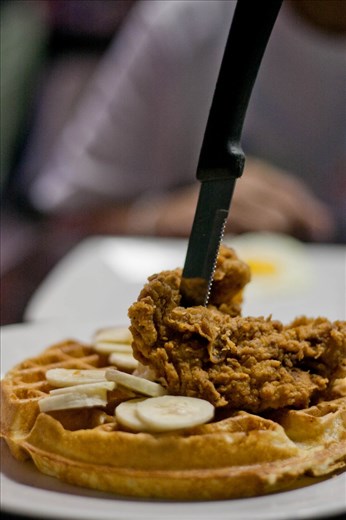 Southern favorite at Okra Grill. Sweet tea, spanish moss trees, southern hospitality and beautiful sunsets are some of the attractions down south, but trying chicken and waffles completes the Southern experience.