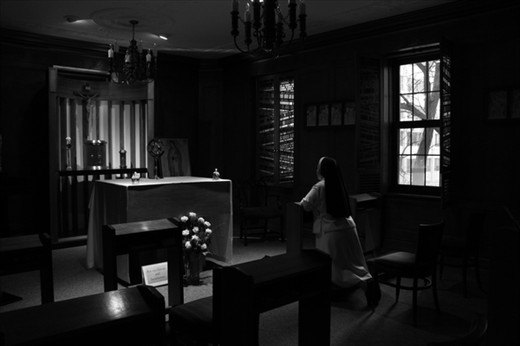 Sister Manuela praying in the prayer room. 