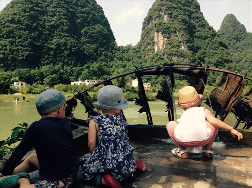 Children play. Traveling with small children has its challenges, but they find ways to play anywhere and help connect us with people that we can't really communicate with.