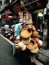 Man selling the typical straw hats.: by hannap, Views[289]