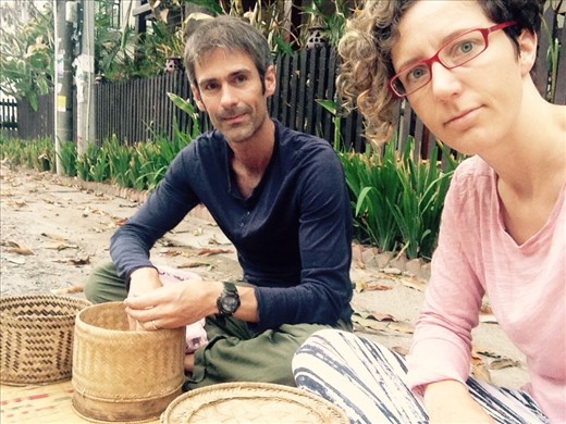 Morning alms ritual where one donates sticky rice to the buddhist monks from the neighborhood temples.