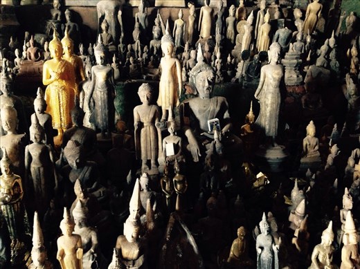 Many buddhas in the Pak Ou cave along the Mekong river. People come here to pay their respect during celebration of the New Year.