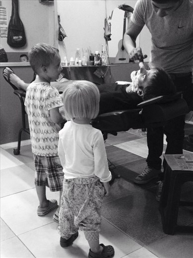 Chris got a nice shave at a local barber shop.