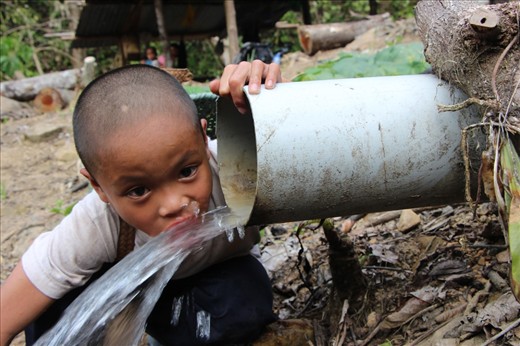 Sungasui felt thirsty after carrying loads of firewood on his backs. The water was fresh from the unpolluted river of Papar, in Sabah, Borneo. A river which will be affected by the proposed Kaiduan Dam. If built will displace 1400 of indigenous Dusun from the ancestral land. 