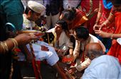 This is one of the many rituals of wedding ceremony. Welcoming the groom and the family. The bride’s father washes the groom’s feet. And then the bride’s family greet them with Aarati and sweets, as a symbol of happiness and good tidings to come and escort them to the wedding hall.: by happyindia, Views[682]