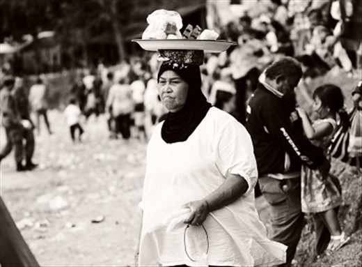 making a living (a mother who is selling food. Almost all of the merchandise in 