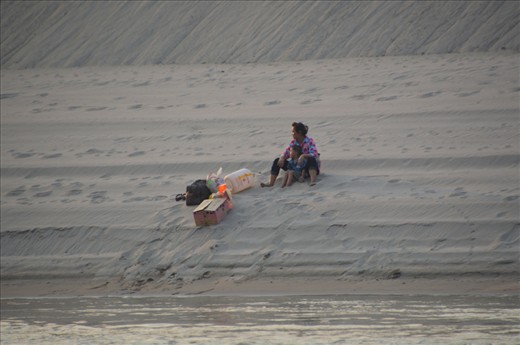 As we drift away mother and child wait for either another ferry or help from her family. I love how peaceful this image is.