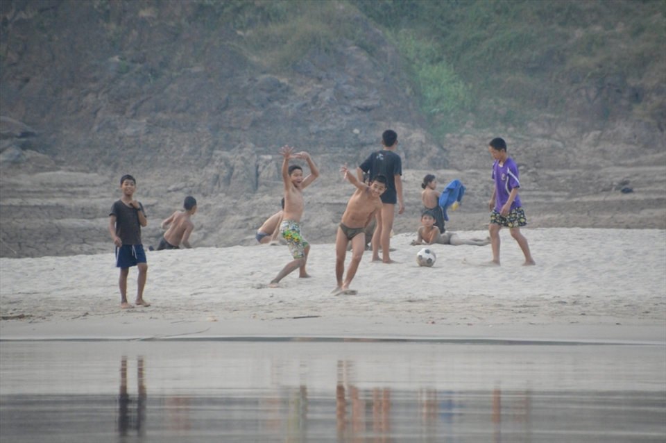 Happy and free. How does this not put a smile on your face. The Mekong's dark history is certainly brightened and forgotten with the spirit of these kids playing on the shore. They loved the interaction with tourists and travellers a like.