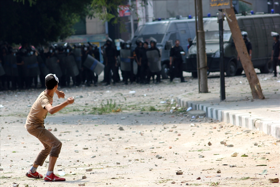 Child during clashes near the U.S. embassy in Cairo