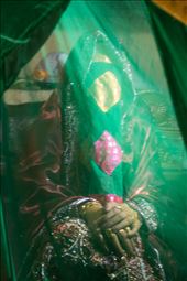 Thuraya lives in a small town in Muscat, Oman. She is a bride to be and decided to follow her town's 7days tradition of bride's beauty treatment. During that week, the bride stays veiled, and only seen by her immediate family members, everyone else will just have a glimpse of her feet or hands as appropriate. Thuraya already had two days of body cleansing  followed by rubbing her skin with sweet smell of sandal wood paste, and tonight she will have her feet and hands painted with the paste of ground henna leaves which will leave on her skin a dark red color once dry.: by hawwa, Views[609]