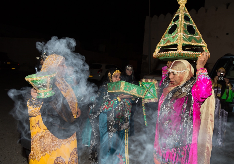 Relatives from the groom side gather to lead the procession to the bride's house, carrying with them the bride's Henna while singing local songs and making sure the sweet smell of incense declares their presence in the neighborhood.