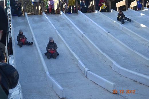 Just a ice slide that the girls are riding on. 