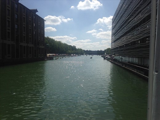 The canal by my hostel in Paris. The weird squiggly building on the right houses the hostel. 