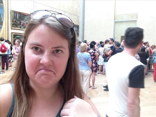 When you try to take a selfie with the Mona Lisa but it's too small, there are too many people, and someone walks right in front of it as you're taking the picture. 