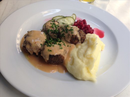 Swedish meatballs in cream sauce, mashed potatoes, lingonberries, and pickled cucumbers. Yummy!