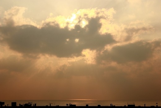 You see that spotlight over there? That is where the angels landed!

Made it to the beach early morning to capture the sunrise. It suddenly got overcast and I thought 