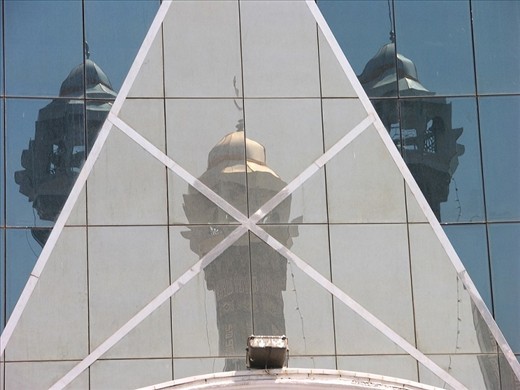 Reflection of a mosque in the Glass Shop