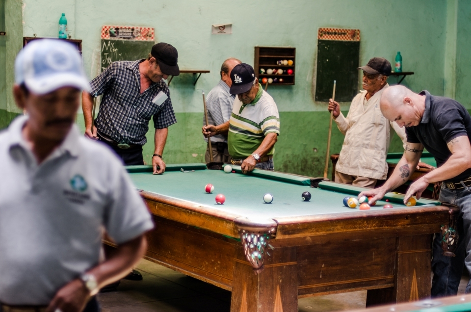 Pool players re rack a game and gather winnings after game finishes in a pool bar in Tepic, Mexico.
Some of these players told us about their time spent in mexican jails, but at the same time were friendly and allowed me to take photos.