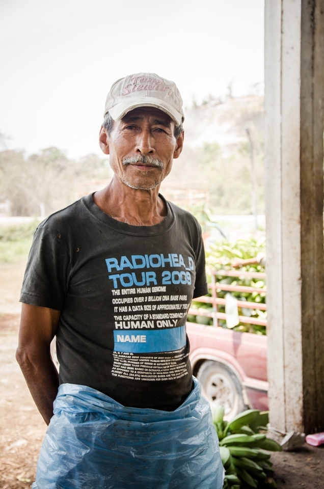 A Banana Harvest worker stops work to pose for a photograph at a Banana packing facility near San Blas, Mexico. The local workers at this Banana harvesting plant gladly showed us the process the use to clean and pack the Harvested Bananas. 