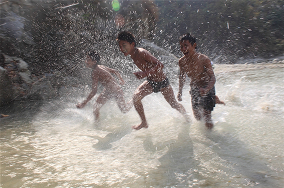Yang kids playing at river side, Out side of Bhutanese Refugee Camp.Nepal, 2012