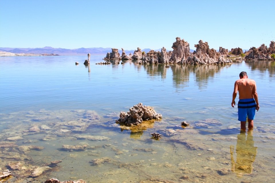 Saline Swim: The beauty of Mono Lake’s unique geology draws thousands of tourists every year, some of whom enjoy its saline waters.