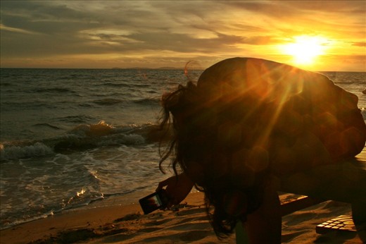 she put such an effort to bend like that to get the best angle of the sunset