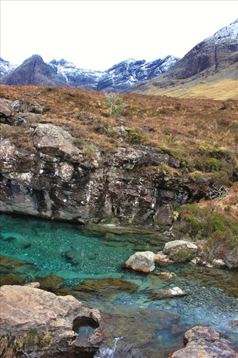 Faerie Pools! Believed to go a beautiful green colour in the sunshine.. the blue was still beautiful in the grey sky we had.. the water was so clear we wanted to swim... If it wasn't 5 degrees. ..