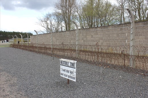 Neutral land. . Where if a prisoner stepped onto the gravel.. they were shot dead immediately. It's said that the first person who was ever killed in the concentration camp was by an SS guard who threw the prisoners hat onto the gravel then told him to go pick it up, the prisoner could either say no and be beaten slowly to death. . Or walk onto the gravel and be shot straight away.