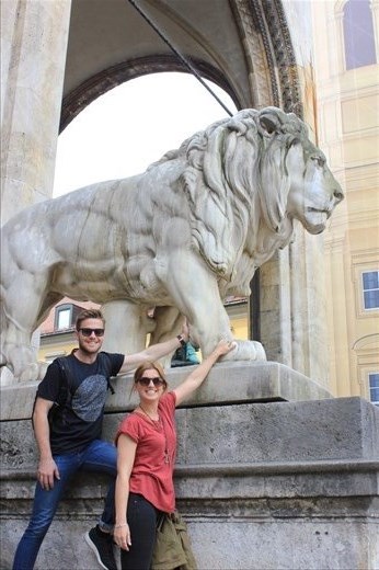 Rubbing the Lions foot for goodluck