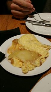 One of the more traditional Spanish tapas.. potato and egg omelette kinda thing. . Deeelicious and buttery: by hethoandstokesyseuropeanadventure, Views[185]