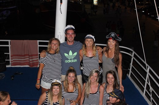 Sailors party with our trusty captain of the boat!